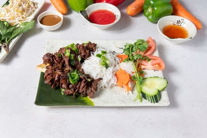 A9. Grilled Pork Skewers (2 ) - Thịt Nướng Xiên.