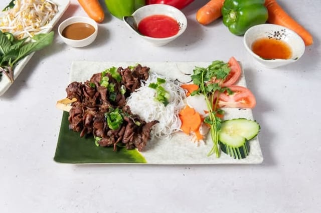 A9. Grilled Pork Skewers (2) - Thịt Nướng Xiên.